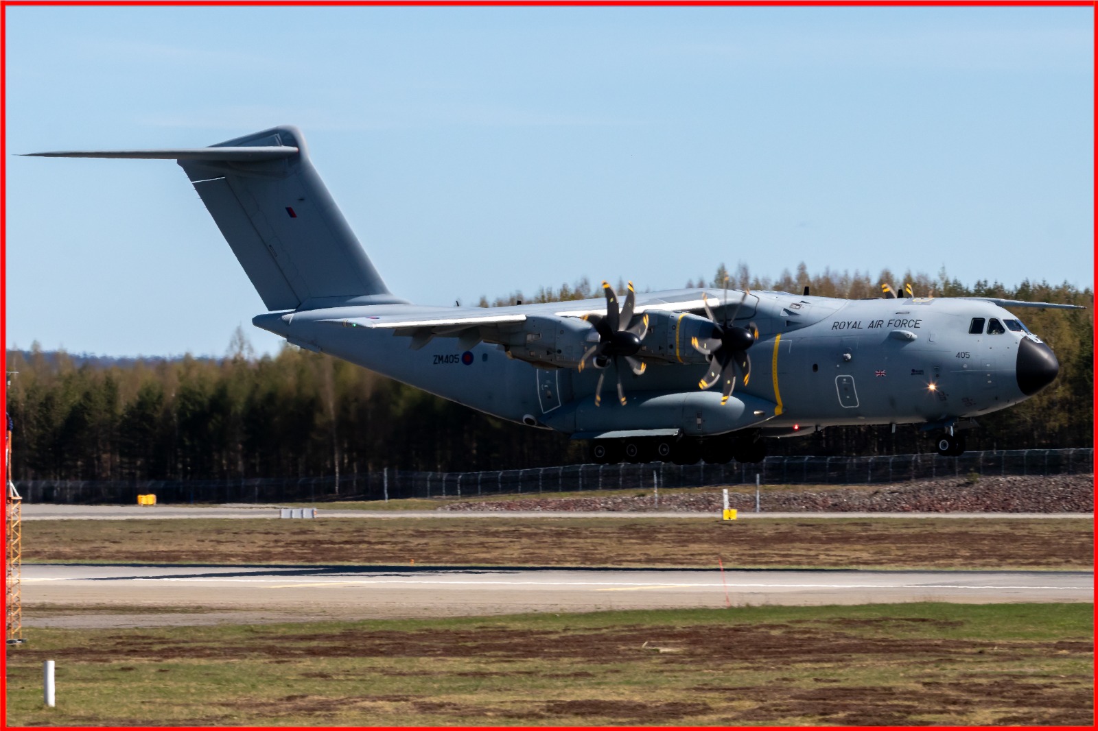 Backlit aircraft with the tail in the shade